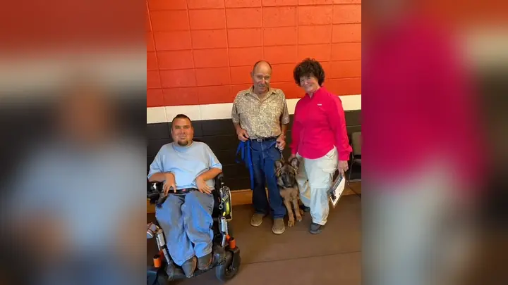 Clients and dogs in a Prodogz Dog Training puppy class led by Jason Lake in Medford, Oregon on July 21, 2021