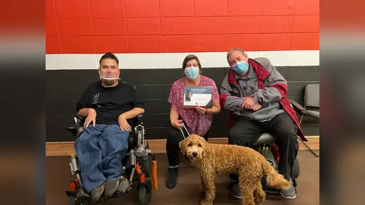 Clients and dogs in a Prodogz Dog Training puppy class led by Jason Lake in Medford, Oregon on December 17, 2021