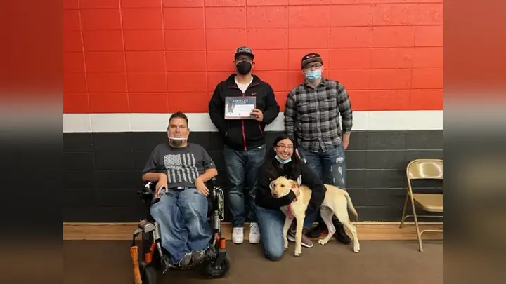 Clients and dogs in a Prodogz Dog Training puppy class led by Jason Lake in Medford, Oregon on January 21, 2022