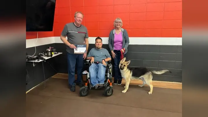 Clients and dogs in a Prodogz Dog Training puppy class led by Jason Lake in Medford, Oregon on May 13, 2022