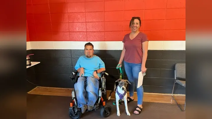 Clients and dogs in a Prodogz Dog Training puppy class led by Jason Lake in Medford, Oregon on July 1, 2022