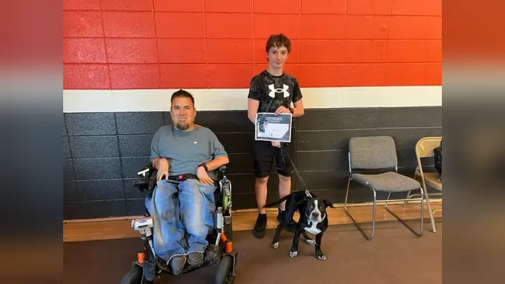 Clients and dogs in a Prodogz Dog Training puppy class led by Jason Lake in Medford, Oregon on July 22, 2022