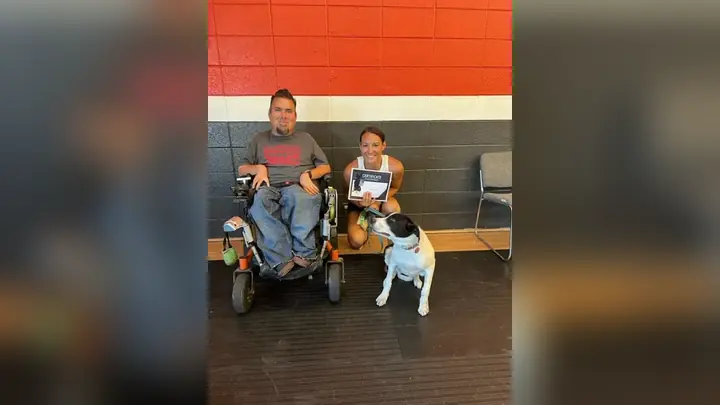 Clients and dogs in a Prodogz Dog Training puppy class led by Jason Lake in Medford, Oregon on July 14, 2023