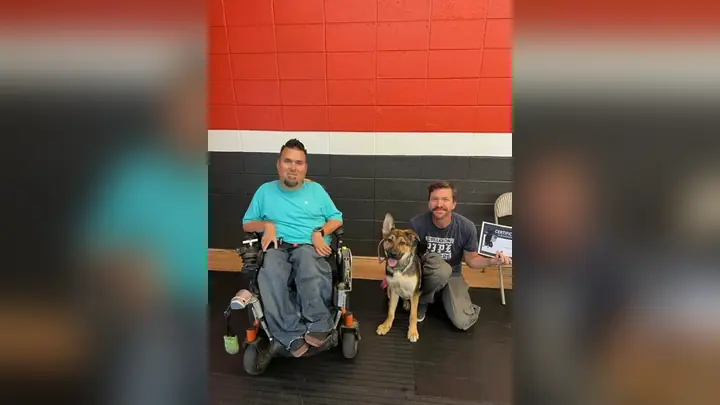 Clients and dogs in a Prodogz Dog Training puppy class led by Jason Lake in Medford, Oregon on August 18, 2023