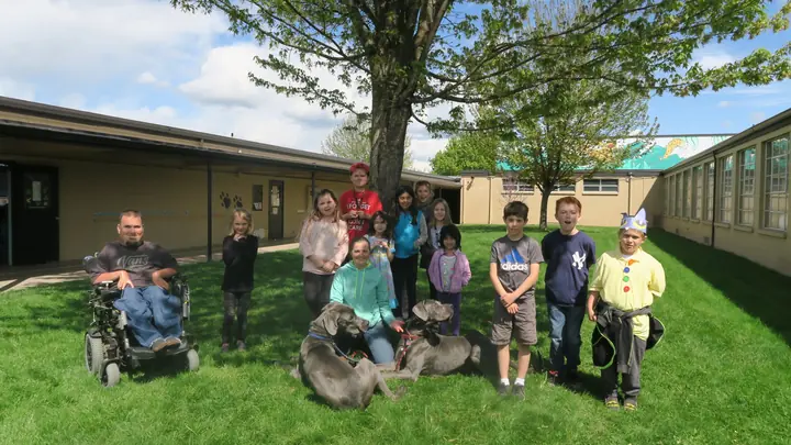 Students watching a dog training presentation by Jason Lake of Prodogz Dog Training at Jewett Elementary School — April 2017