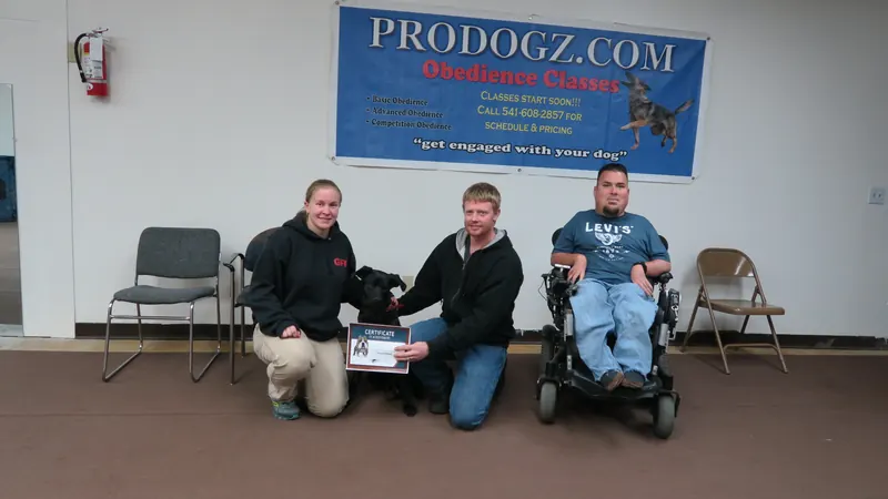 Clients and dogs in a Prodogz Dog Training basic obedience class led by Jason Lake in Medford, Oregon — February 26, 2018, photo 20