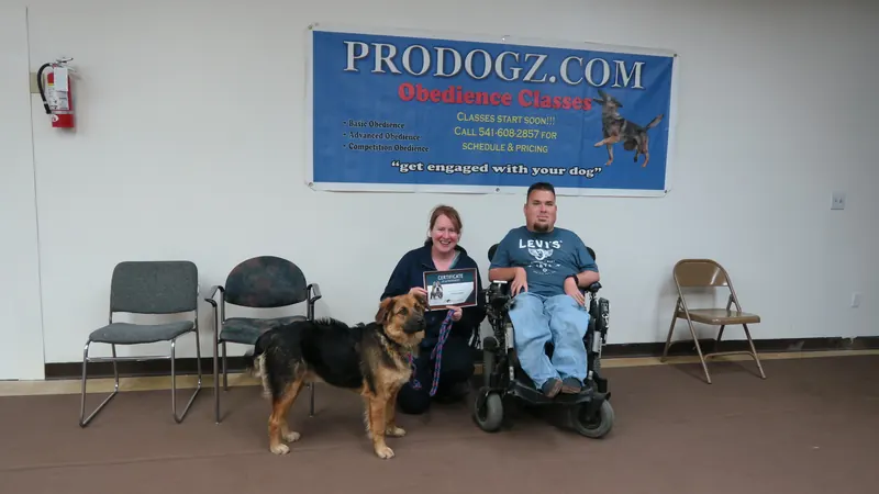 Clients and dogs in a Prodogz Dog Training basic obedience class led by Jason Lake in Medford, Oregon — February 26, 2018, photo 21