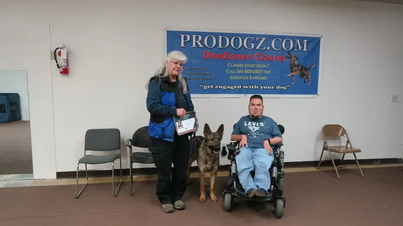 Clients and dogs in a Prodogz Dog Training basic obedience class led by Jason Lake in Medford, Oregon — February 26, 2018, photo 23