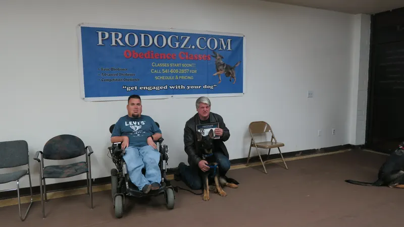 Clients and dogs in a Prodogz Dog Training basic obedience class led by Jason Lake in Medford, Oregon — February 26, 2018, photo 27