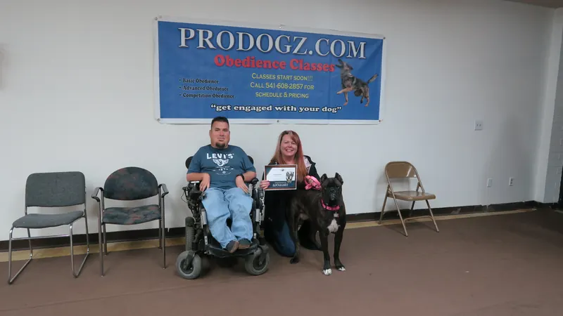 Clients and dogs in a Prodogz Dog Training basic obedience class led by Jason Lake in Medford, Oregon — February 26, 2018, photo 28