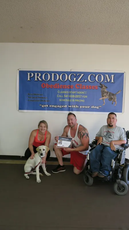 Clients and dogs in a Prodogz Dog Training basic obedience class led by Jason Lake in Medford, Oregon — May 21, 2018, photo 11