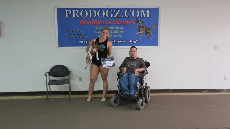 Clients and dogs in a Prodogz Dog Training basic obedience class led by Jason Lake in Medford, Oregon — July 23, 2018, photo 12