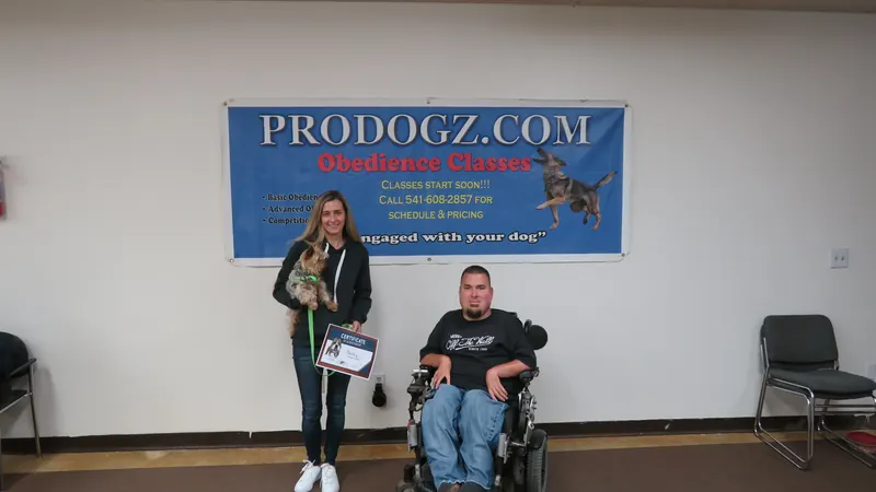 Clients and dogs in a Prodogz Dog Training basic obedience class led by Jason Lake in Medford, Oregon — November 19, 2018, photo 38