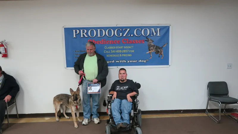 Clients and dogs in a Prodogz Dog Training basic obedience class led by Jason Lake in Medford, Oregon — November 19, 2018, photo 40