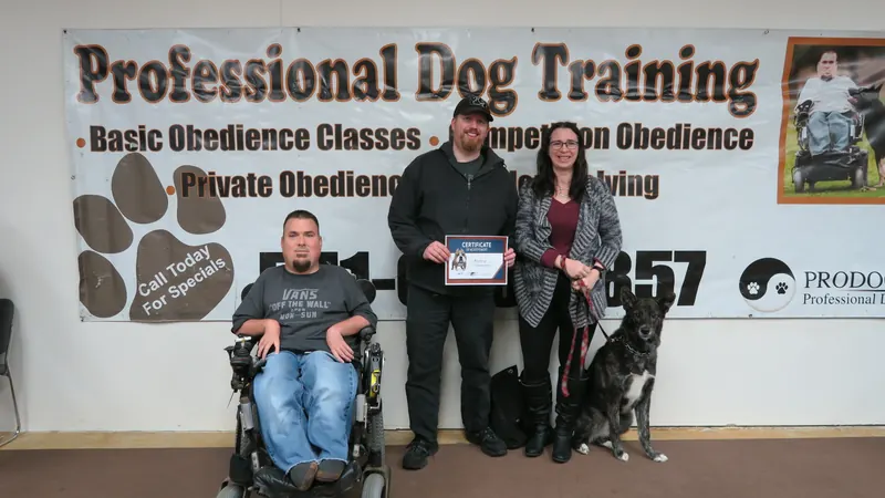 Clients and dogs in a Prodogz Dog Training basic obedience class led by Jason Lake in Medford, Oregon — January 28, 2019, photo 18