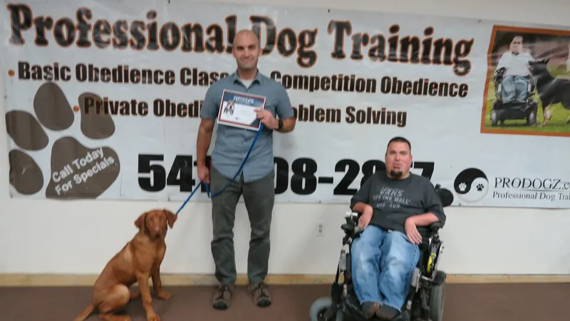 Clients and dogs in a Prodogz Dog Training basic obedience class led by Jason Lake in Medford, Oregon — January 28, 2019, photo 21
