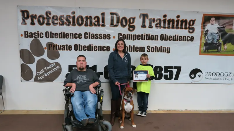 Clients and dogs in a Prodogz Dog Training basic obedience class led by Jason Lake in Medford, Oregon — January 28, 2019, photo 24