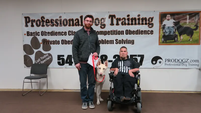 Clients and dogs in a Prodogz Dog Training basic obedience class led by Jason Lake in Medford, Oregon — March 25, 2019, photo 18