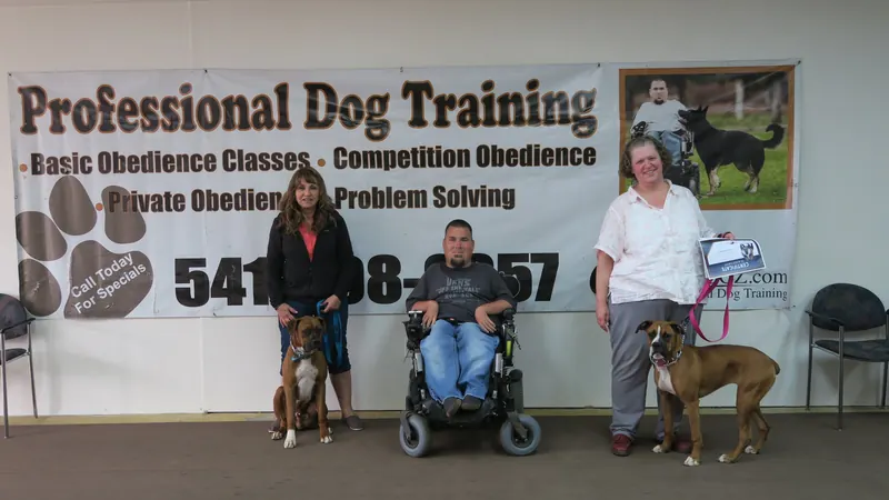 Clients and dogs in a Prodogz Dog Training basic obedience class led by Jason Lake in Medford, Oregon — April 22, 2019, photo 6