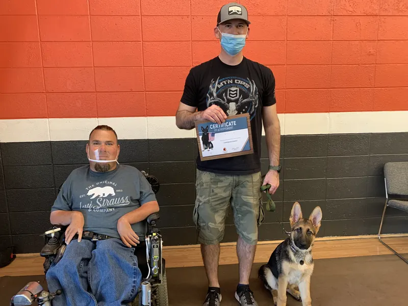 Clients and dogs in a Prodogz Dog Training puppy class led by Jason Lake in Medford, Oregon — April 16, 2021, photo 3