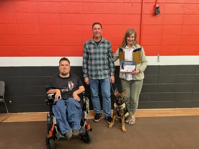 Clients and dogs in a Prodogz Dog Training puppy class led by Jason Lake in Medford, Oregon — November 26, 2021, photo 1
