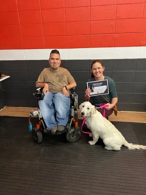 Clients and dogs in a Prodogz Dog Training puppy class led by Jason Lake in Medford, Oregon — December 16, 2022, photo 1