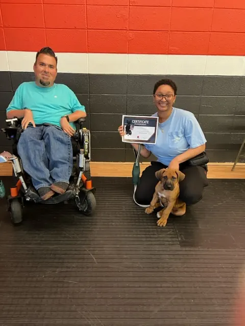 Clients and dogs in a Prodogz Dog Training puppy class led by Jason Lake in Medford, Oregon — April 21, 2023, photo 3