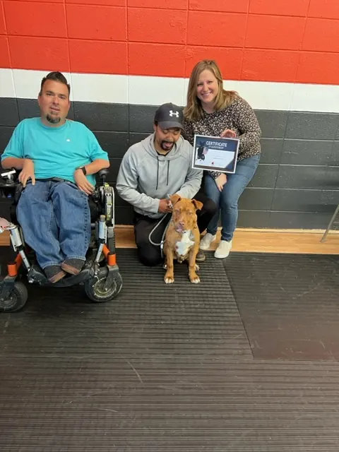 Clients and dogs in a Prodogz Dog Training puppy class led by Jason Lake in Medford, Oregon — April 21, 2023, photo 5