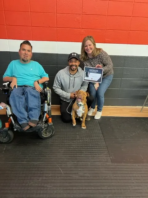 Clients and dogs in a Prodogz Dog Training puppy class led by Jason Lake in Medford, Oregon — April 21, 2023, photo 6