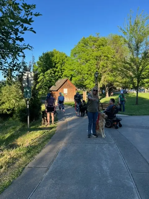 Clients and dogs practicing leash walking with Jason Lake in a Prodogz Move & Groove class in Medford, Oregon — May 14, 2024, photo 2