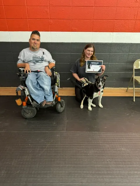 Clients and dogs in a Prodogz Dog Training puppy class led by Jason Lake in Medford, Oregon — October 13, 2024, photo 1
