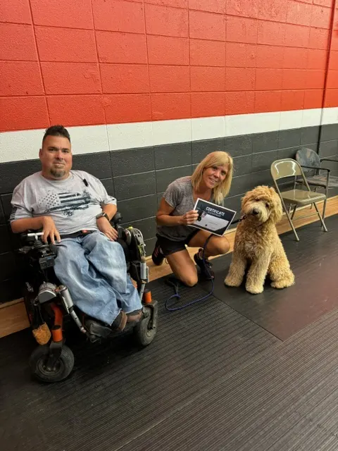 Clients and dogs in a Prodogz Dog Training puppy class led by Jason Lake in Medford, Oregon — October 13, 2024, photo 2