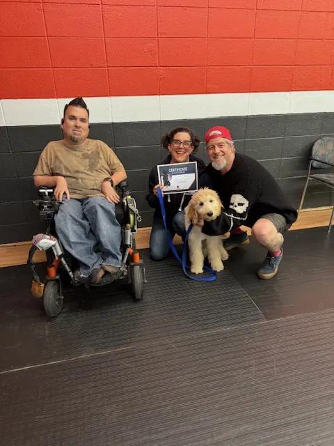 Clients and dogs in a Prodogz Dog Training puppy class led by Jason Lake in Medford, Oregon — February 20, 2025, photo 1