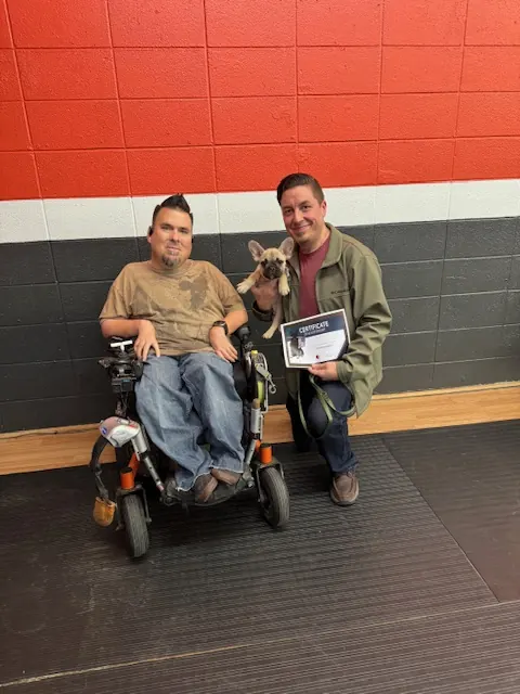 Clients and dogs in a Prodogz Dog Training puppy class led by Jason Lake in Medford, Oregon — February 20, 2025, photo 2