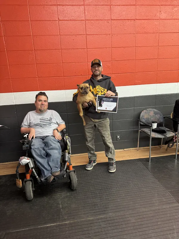 Clients and dogs in a Prodogz Dog Training puppy class led by Jason Lake in Medford, Oregon — March 3, 2025, photo 1