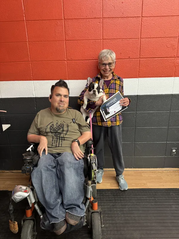 Clients and dogs in a Prodogz Dog Training puppy class led by Jason Lake in Medford, Oregon — March 7, 2025, photo 3