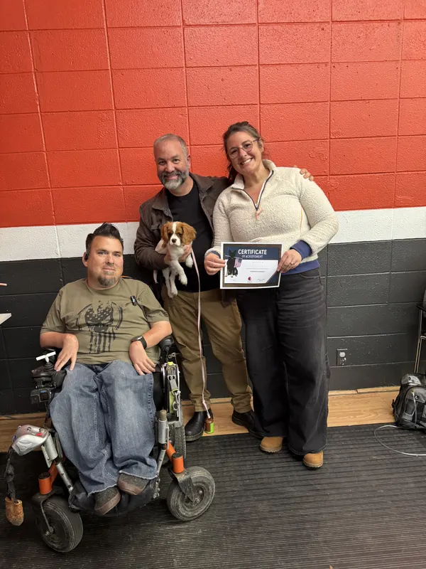 Clients and dogs in a Prodogz Dog Training puppy class led by Jason Lake in Medford, Oregon — March 7, 2025, photo 4