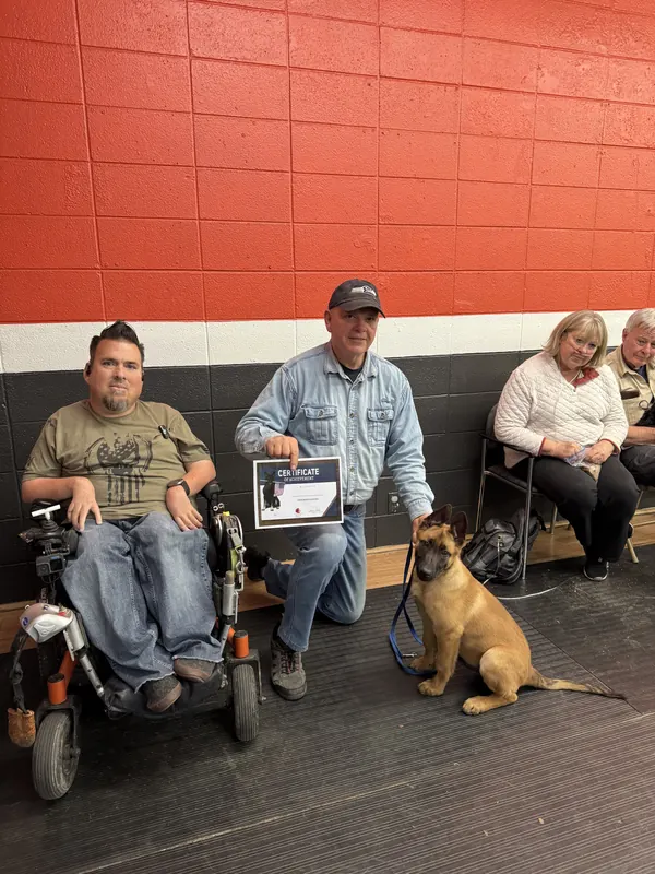 Clients and dogs in a Prodogz Dog Training puppy class led by Jason Lake in Medford, Oregon — March 7, 2025, photo 7