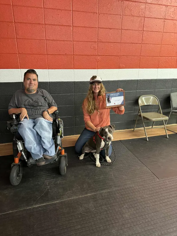 Clients and dogs in a Prodogz Dog Training puppy class led by Jason Lake in Medford, Oregon — October 14, 2025, photo 1