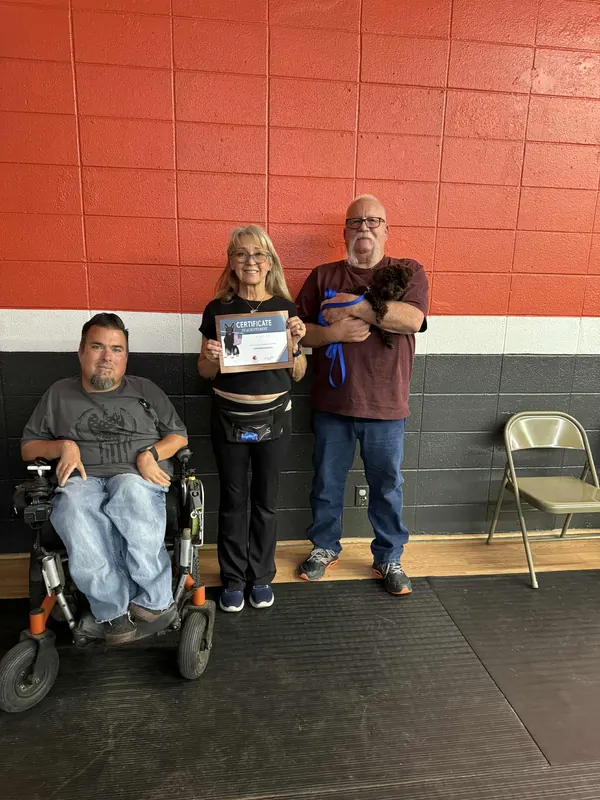 Clients and dogs in a Prodogz Dog Training puppy class led by Jason Lake in Medford, Oregon — October 14, 2025, photo 3