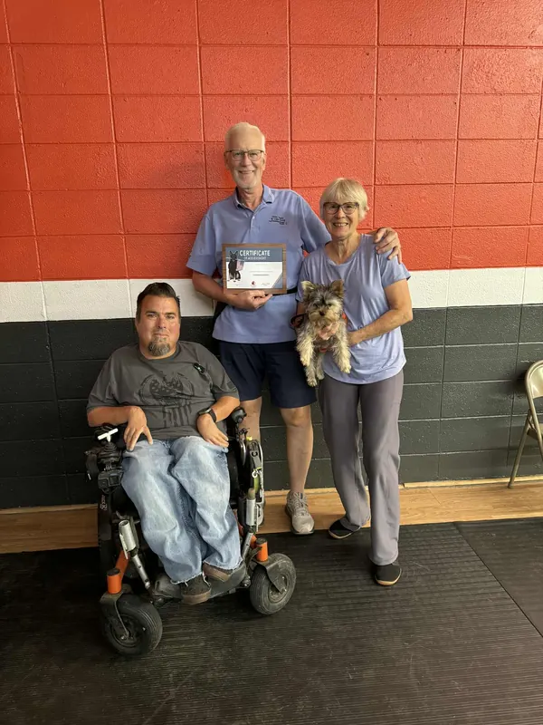 Clients and dogs in a Prodogz Dog Training puppy class led by Jason Lake in Medford, Oregon — October 14, 2025, photo 4